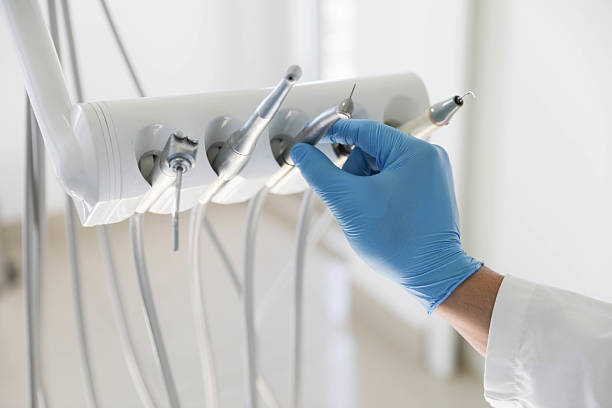 Professional Emergency Dentist technician working in Troy Hills, NJ